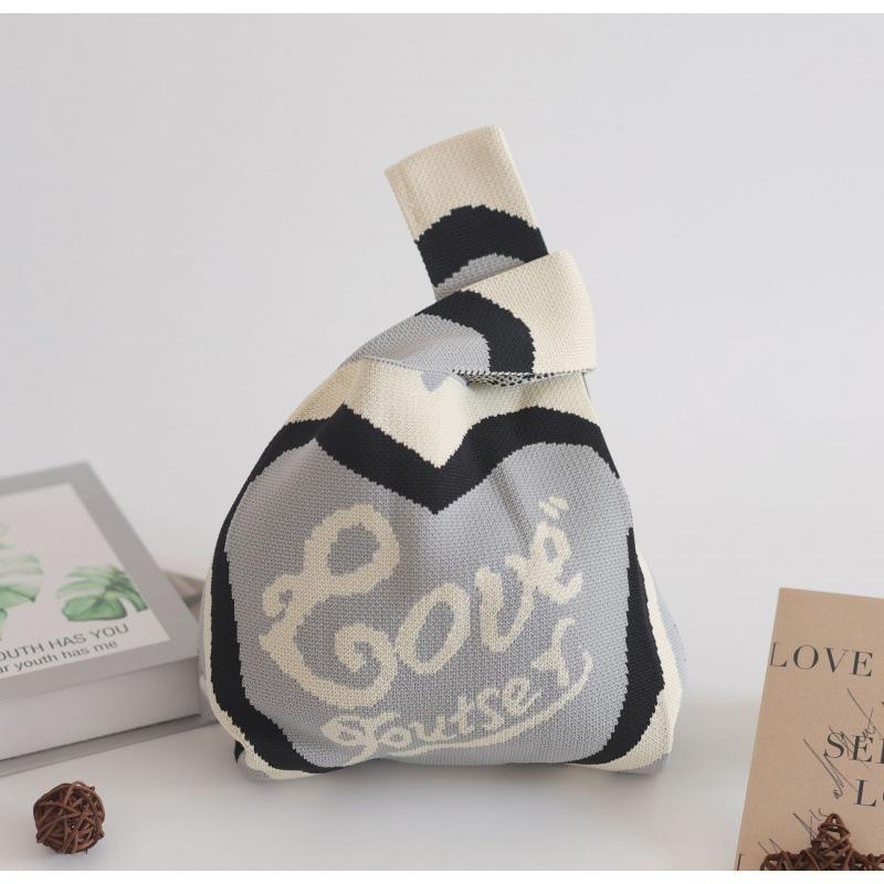 Ins Internet celebrity handbag women's knitted wool bucket bag Japanese and Korean version versatile hand carry casual tote bag box lunch bag