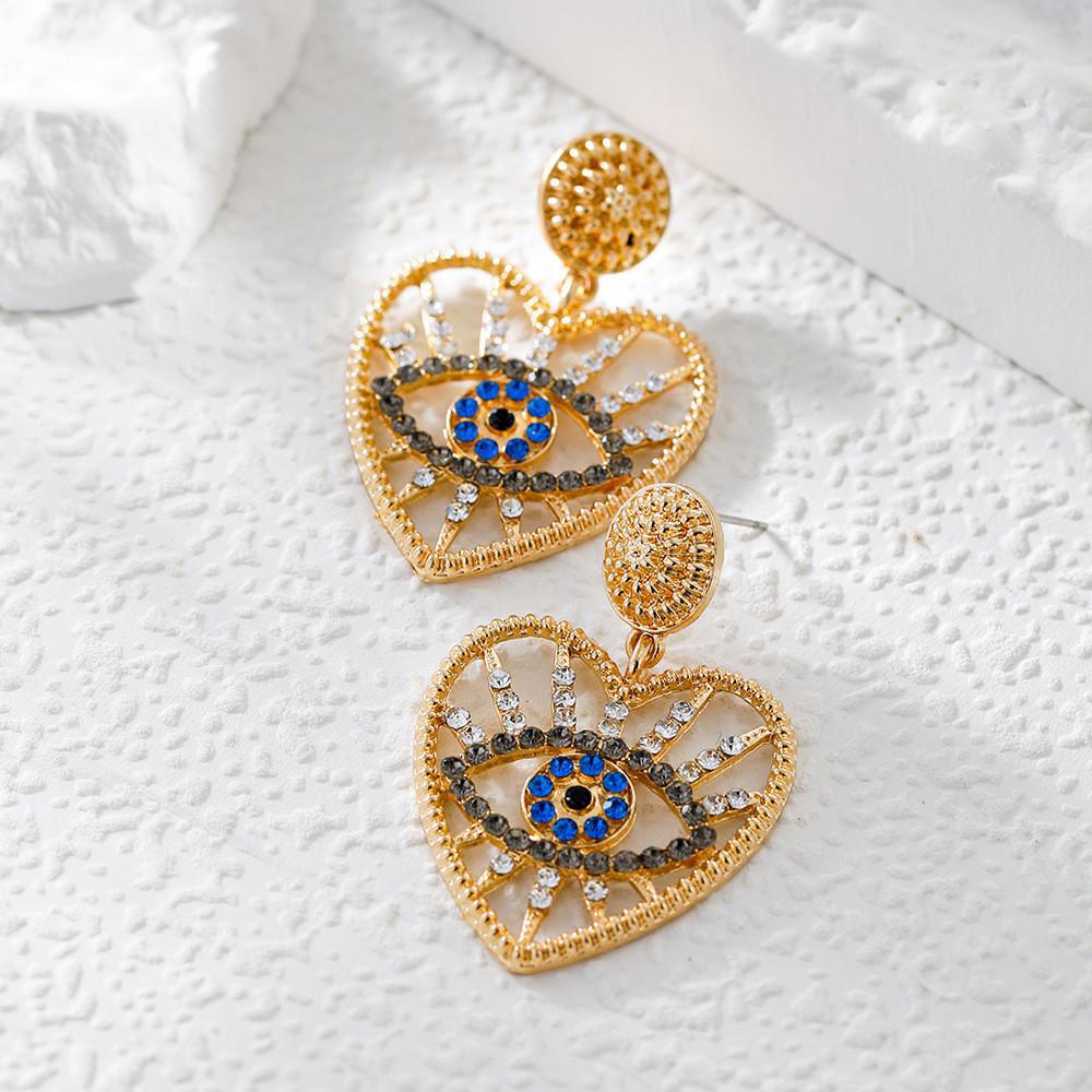 Trendy And Stylish Alloy Geometric Eye Hollow-out Earrings With Diamond Inlay