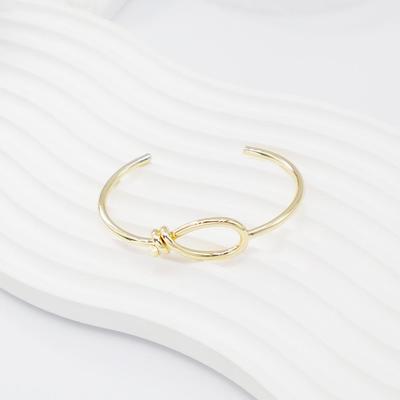 Elegant Gold Knotted Open Cuff Bracelet - Versatile C-Shaped Design for European & American Style