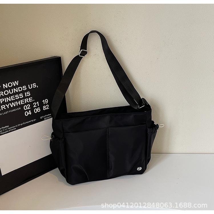 

2025 весна и лето новый студенческий класс сумка-мессенджер женская универсальная модная повседневная сумка-тоут из ткани Оксфорд