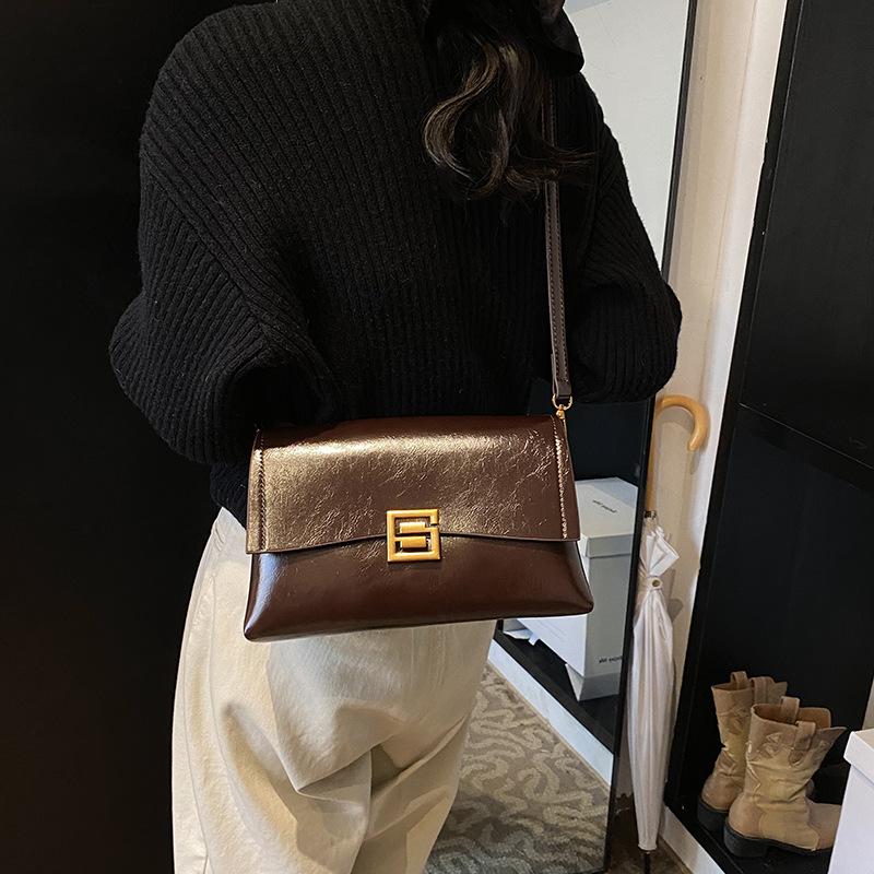 

Сумка под мышкой женская сумка 2025 новый нишевый дизайн высококлассная осенне-зимняя универсальная цепочка на плечо маленькая квадратная сумка 26.5*9*16