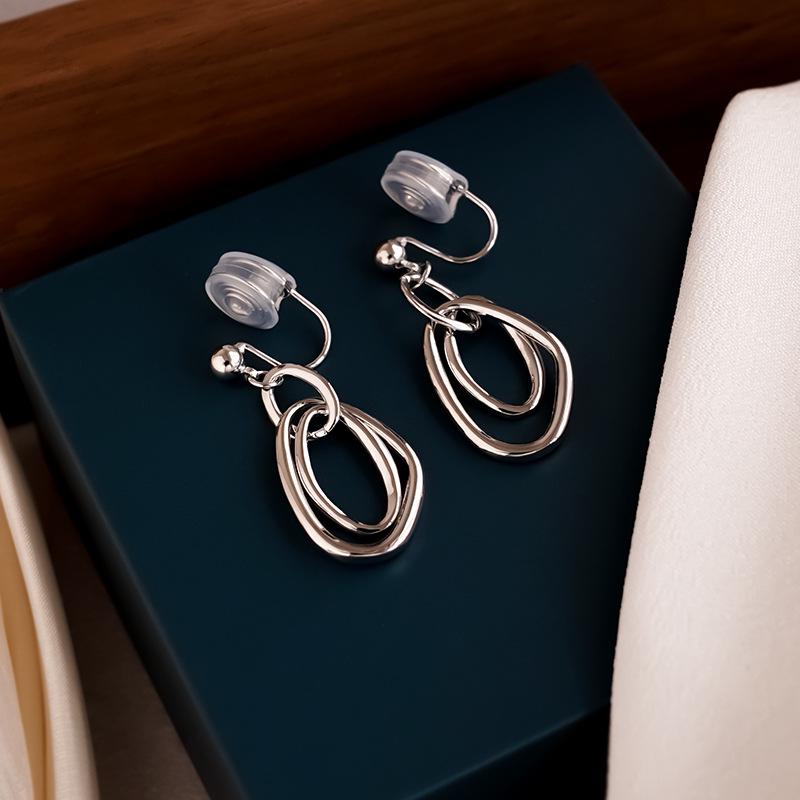 Niche Metal Circle Clip-On Earrings for Unpierced Ears - Fashionable, Mosquito Coil Design