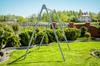 Frame for a garden swing, gray + colorful stork's nest + board