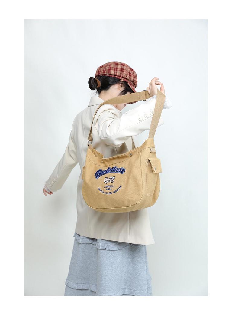Korean Trendy Canvas Messenger Bag: Large Capacity for Women & Men, Sports Style