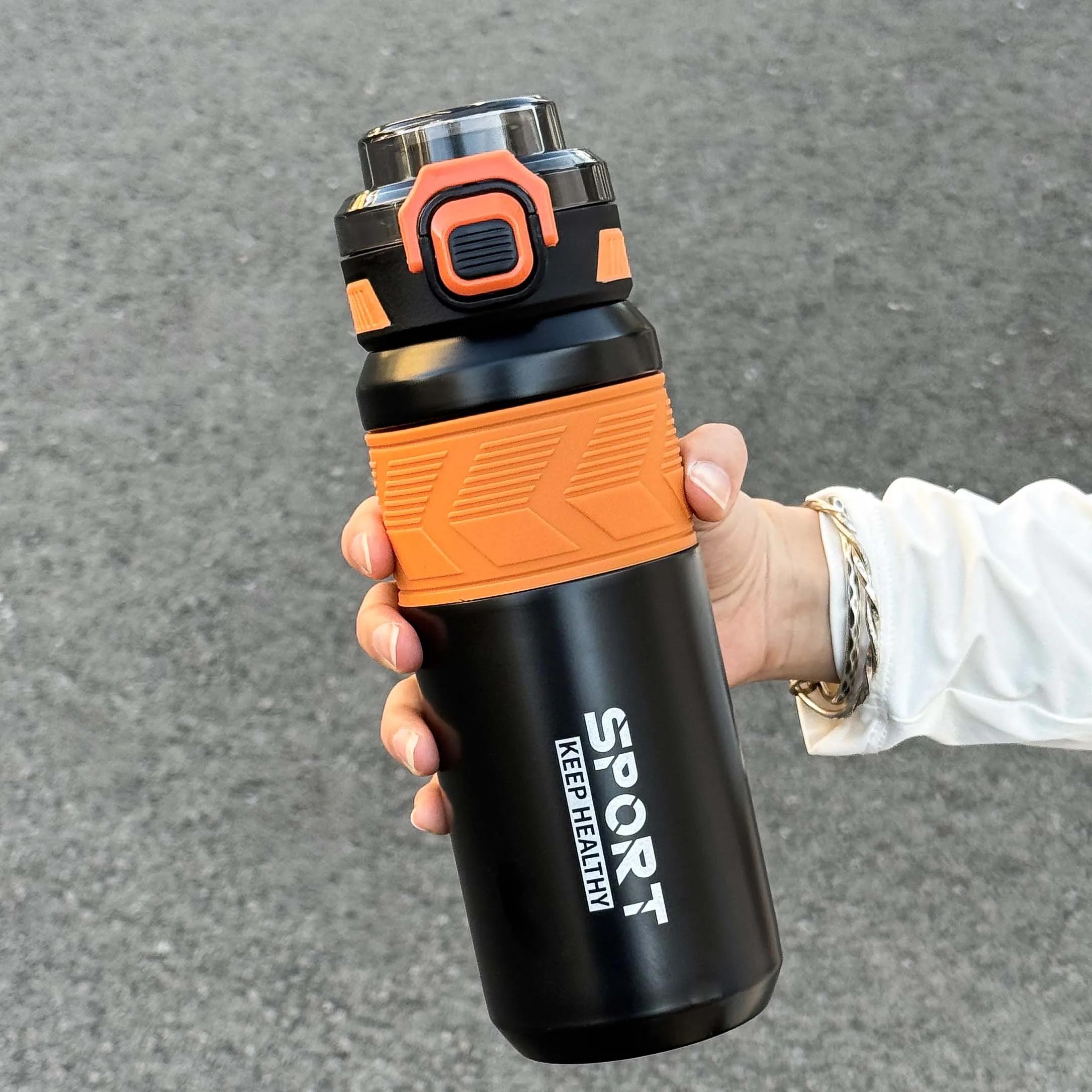 

650ml stainless steel insulated bottle with handle, dual drinking lid design, fashion vacuum thermos for outdoor travel sports 601-700ml чёрный