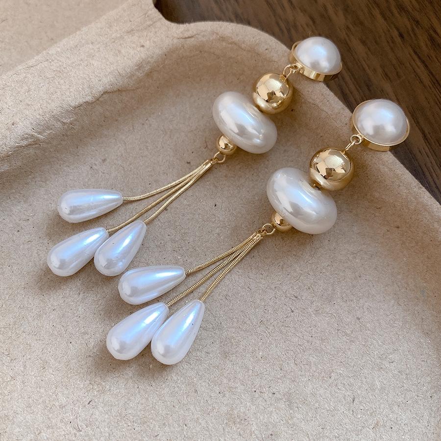 

Silver needle round pearl water drop fringed earrings light luxury high-end stud earrings French style court style temperament earrings