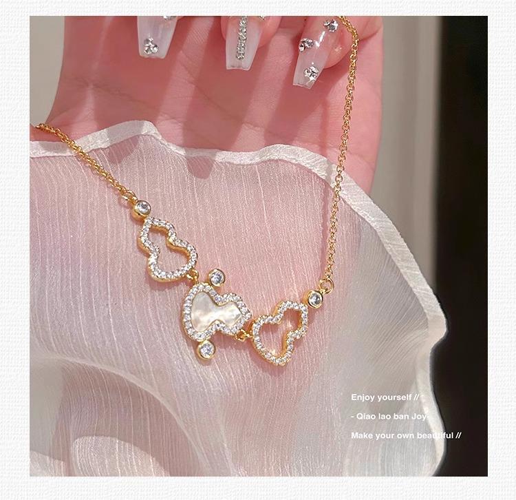 Gourd Necklace: White Mother-of-Pearl & Burgundy Gold on Luxurious Clavicle Chain with Sparkling Diamond Texture