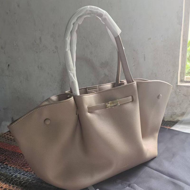 Wing bag, dumpling bag, large capacity tote bag, versatile bag, niche high-end small handbag.