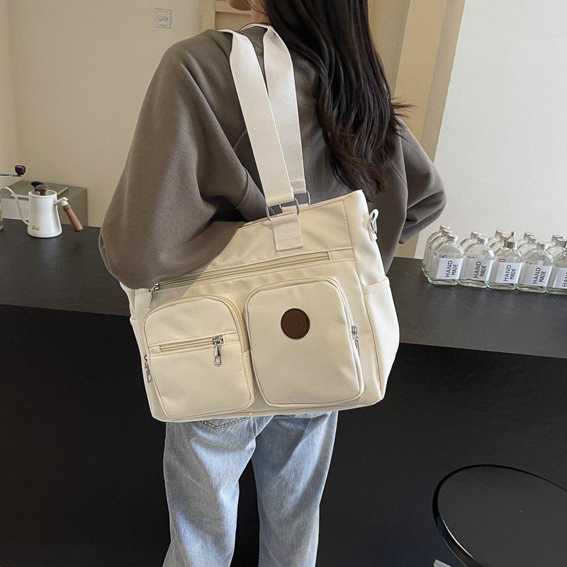 College students commute to class, large-capacity handheld cloth bags, large bags, women's new casual canvas bags, shoulder tote bags