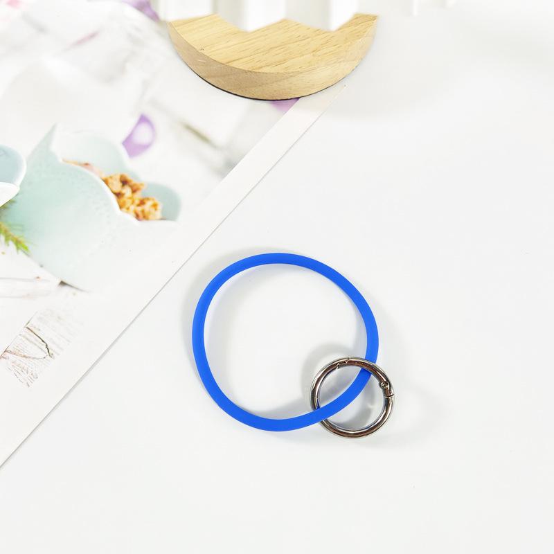 Einfarbige Silikon-Handyhülle mit befestigtem Schlüsselanhänger-Lanyard zum Schutz vor Verlust.