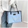 Fashion Trend Embossed Handbag 2025 College Student Versatile Large Capacity Commuting Appearance Handheld Canvas Shoulder Bag