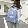 School BagsNew casual backpack, male and female junior high school college student , simple and versatile outdoor travel backpack tide