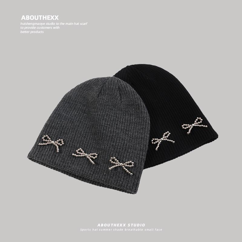 Korean Niche Hat Women's Bow Knitted Woolen Hat Autumn and Winter High End Cold Hat Warm and Versatile Ear Protection Hat Trend