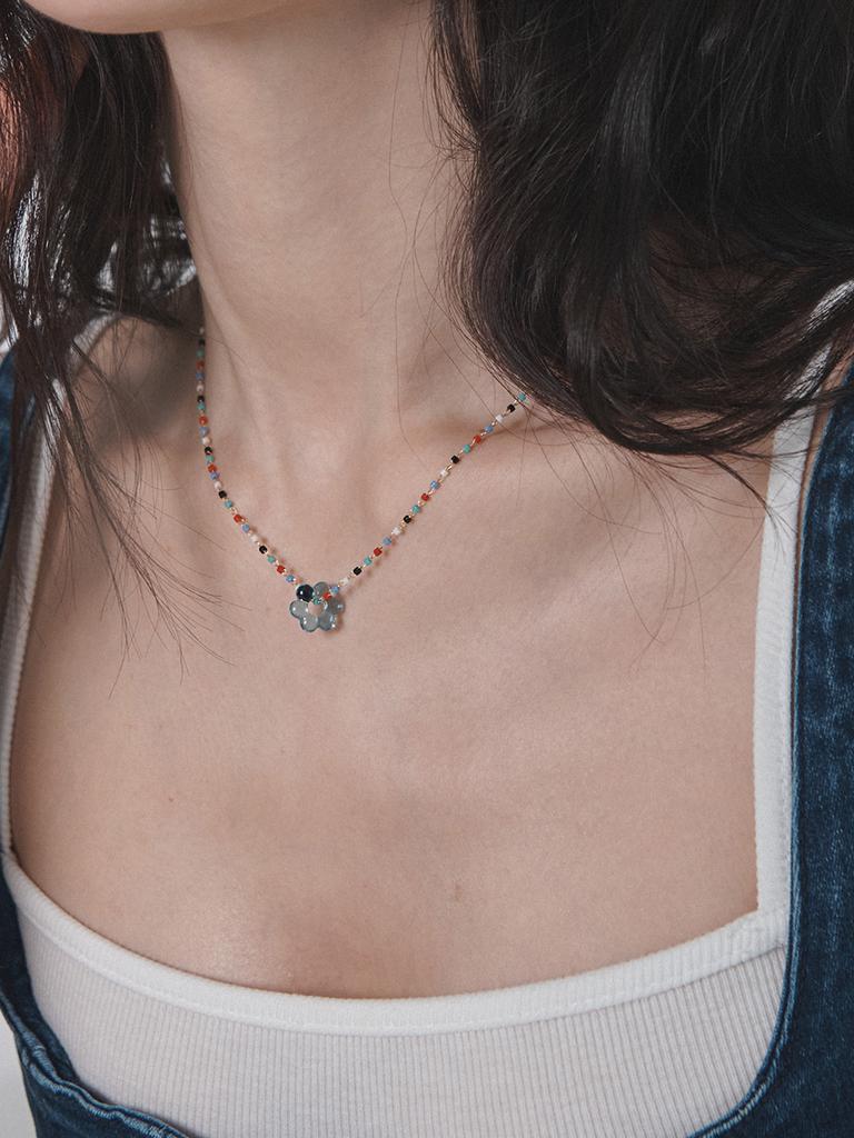 Primaute Chewing Flower Necklace