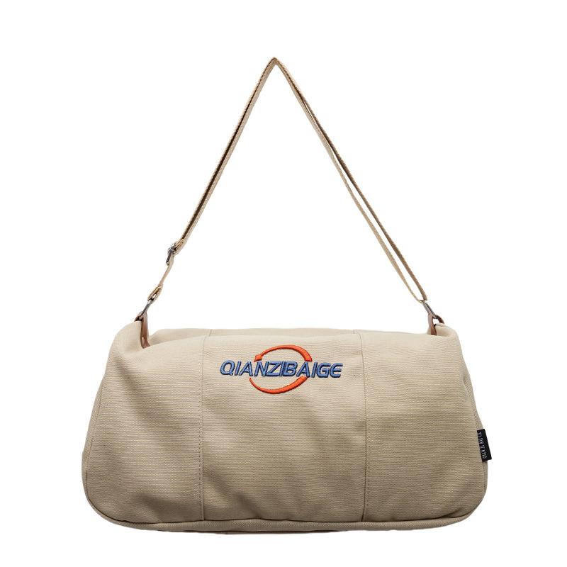 

Casual fashion canvas bag simple and versatile foreign style shoulder bag women s Korean version Harajuku handbag light messenger bag 37*20*21