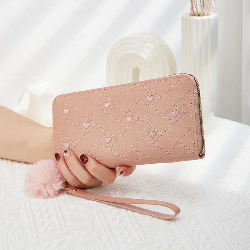 Spring and summer new women's wallet indentation medium and long clutch bag trendy love hairball change mobile phone bag