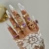European and American new dripping butterfly imitation gemstone and diamond ring set Geometric twist ring seven-piece set