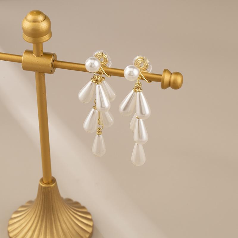 

Роскошные длинные серьги с искусственным жемчугом для женщин, модные элегантные противомоскитные спирали без пирсинга, зажим для ушей