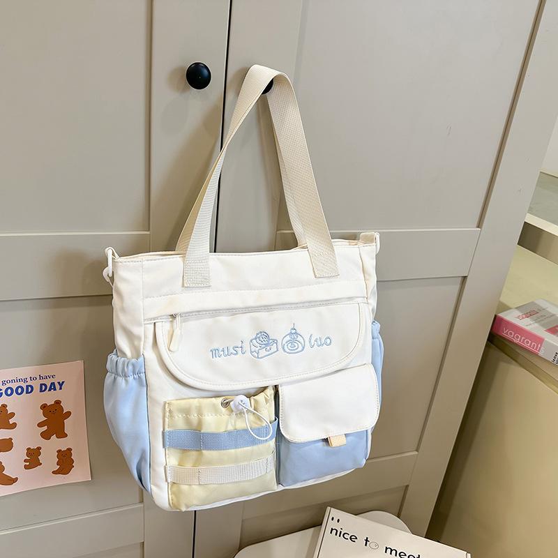 

New cute contrasting color largecapacity shoulder bag soft girl portable messenger bag highvalue student makeup bag