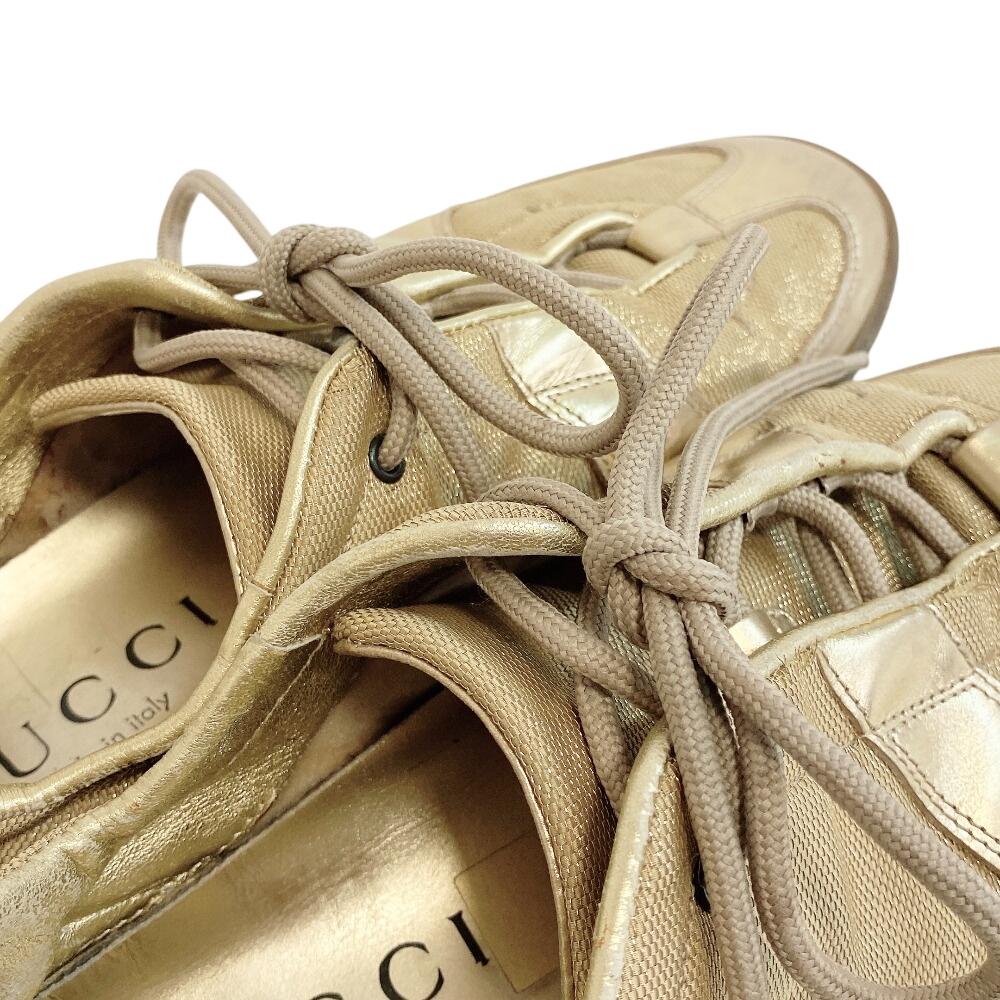 Gucci Niedrig geschnittene Leder-Sneaker goldfarbenes Leder Gebraucht