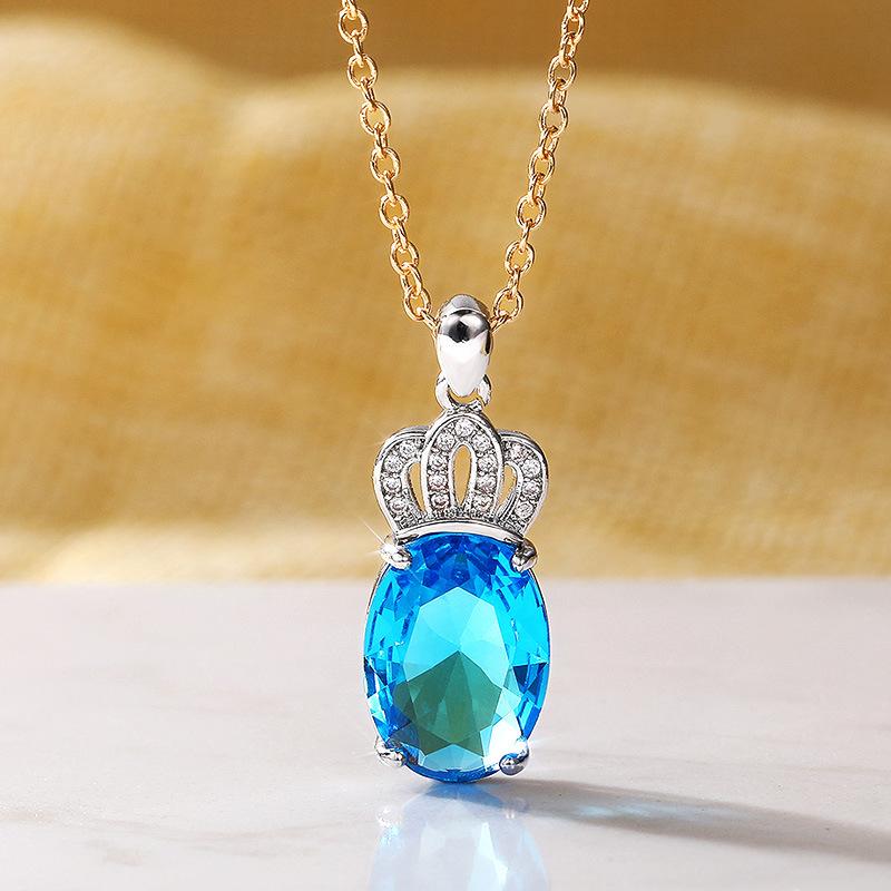 Hollow Crown Top Four Prong Oval Blue Cubic Zirconia Pendant Necklace