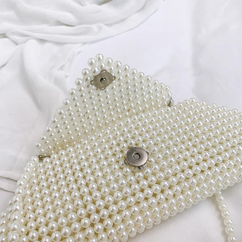 Holding pearl bag women's new spring and summer fashion woven bead small square bag temperament shoulder bag