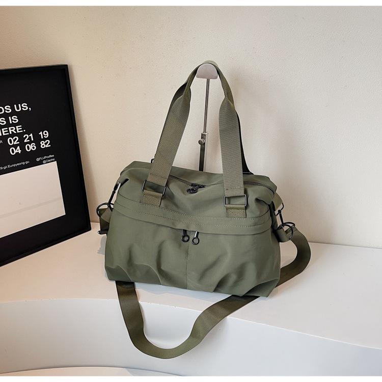 Japanese hand-held travel bags for men and women large-capacity short-distance travel cloth bags shoulder messenger bags fashion sports fitness bags