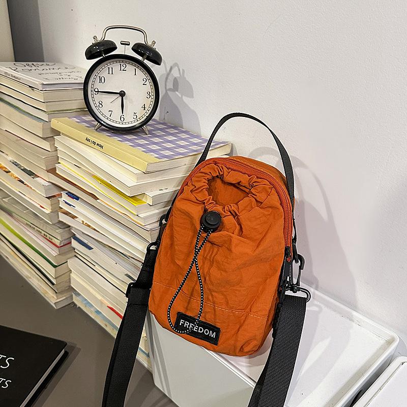 

Crossbody bag, outdoor multi-functional mobile phone, shoulder bag, water bottle bag, water cup bag, women, light cycling, shoulder backpack women помаранчевий