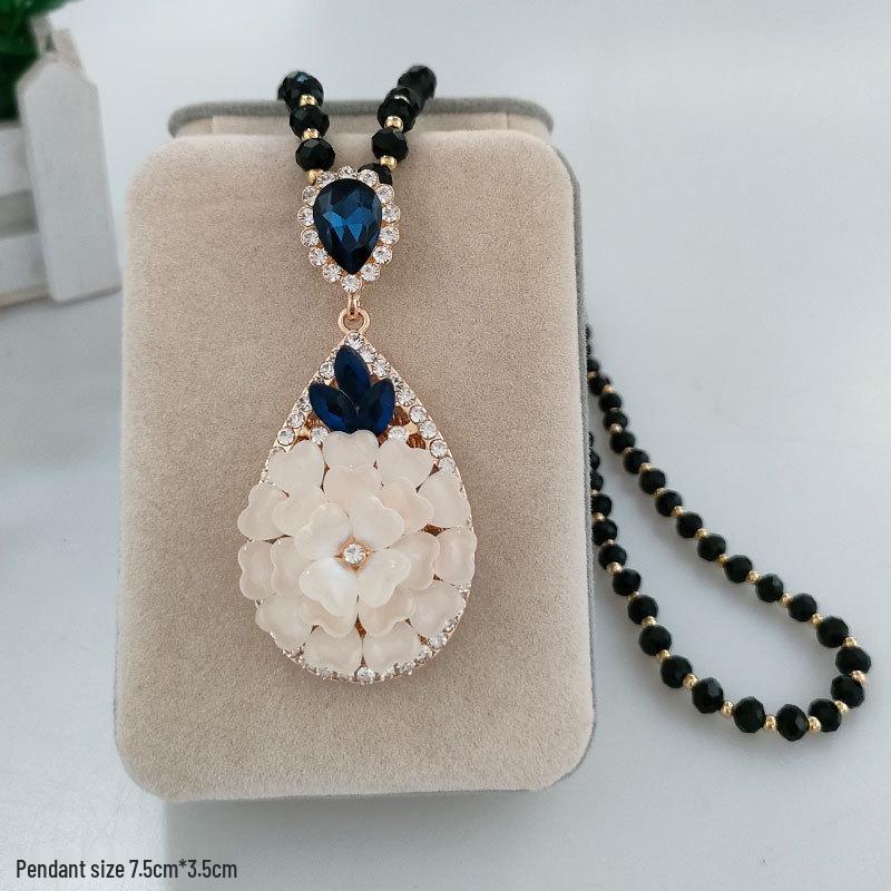 Damen Lange Blumen-Anhänger-Halskette - Elegante Wassertropfen-Pulloverkette für Herbst/Winter