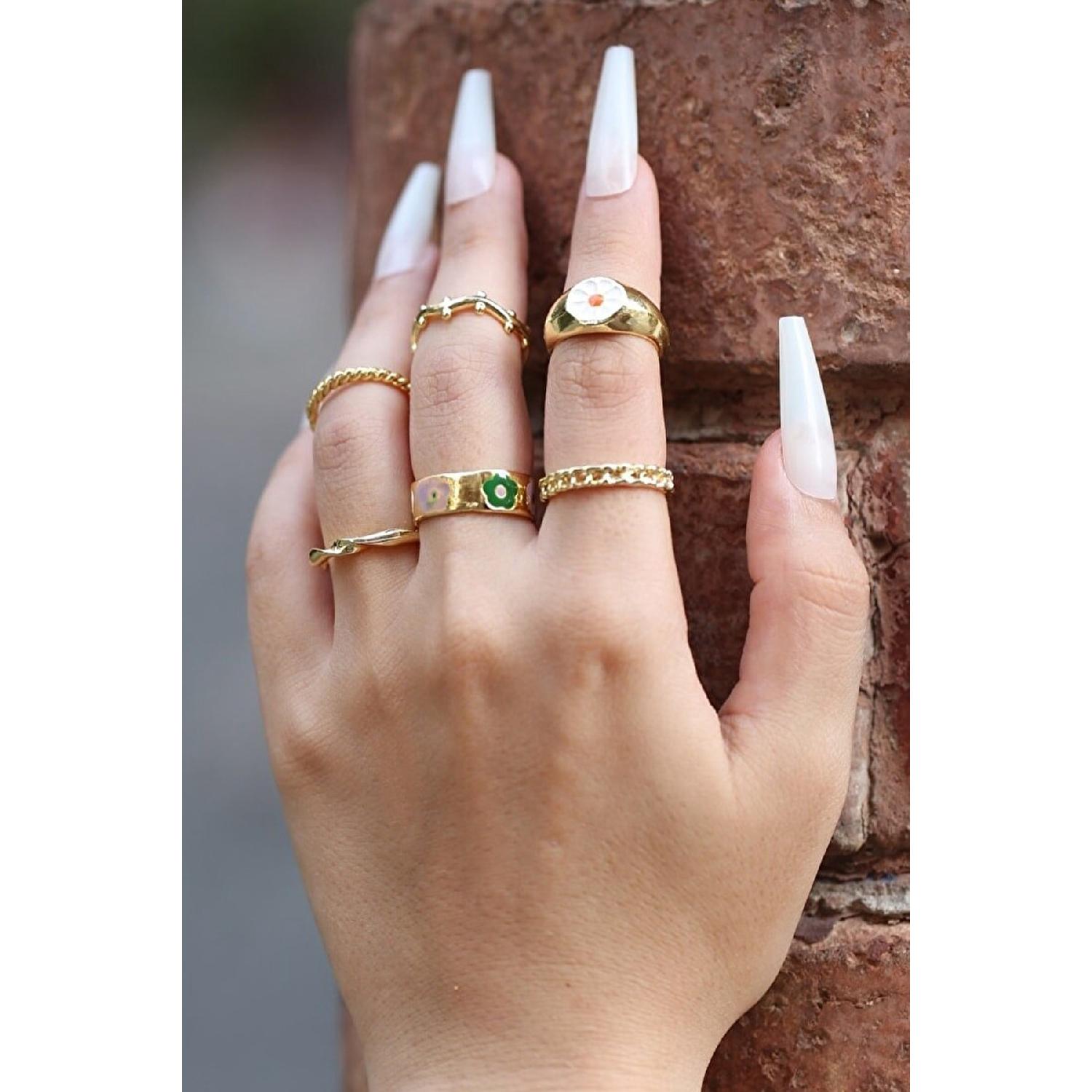 

Набор из 6 колец цвета золота 1297 пробы