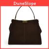 Vintage-Schultertasche aus Wildleder in Unifarbe mit goldener Schnalle und Schlossverschluss für Damen, ideal für den täglichen Gebrauch.