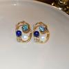 European and American metal wind hollow flower fishtail pearl earrings exaggerated temperament earrings heavy industry earrings