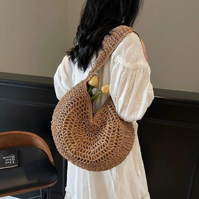 Neue vielseitige Sommer-Hohlstrohtasche große Kapazität handgewebte Tasche einfache Schulter Damen-Tasche Urlaubs-Strandtasche