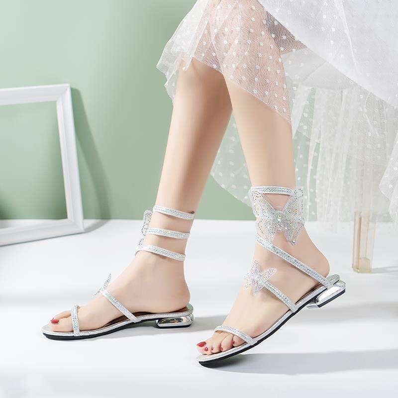Rhinestone Serpentine Winding Sandals Female Flat Bottom One Word with Low Heel Explosion 2025 New Fairy Wind Roman Crystal Shoes