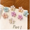 5/10PCS.Spring Camellia Hollow Small Claw Clips for Kids. Minimalist Floral Design, Durable Metal Texture, Secures Bangs Well.