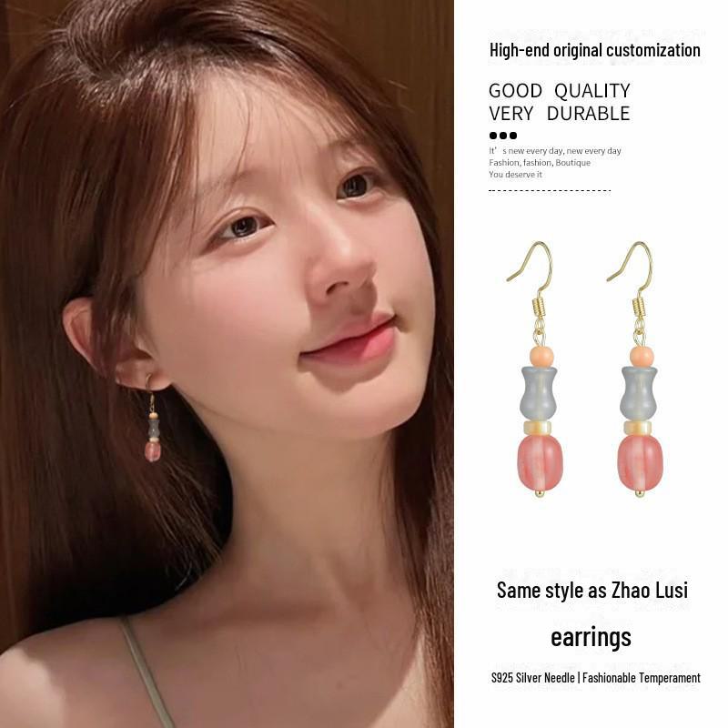 Chinese Jade Moon Tassel Earrings: Unique Design & Elegant Trend