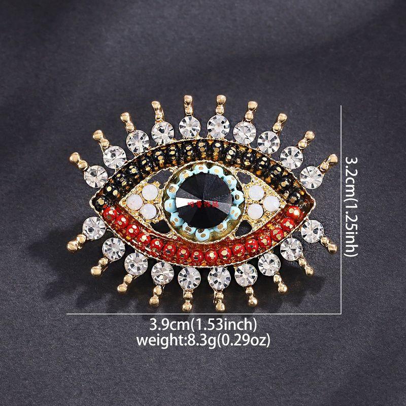 

Retro Rhinestone Alloy Devil s Eye Brooch Stylish Clothing Pin Fashion Tape Fixed Badge Versatile Accessories KC gold Color eyes