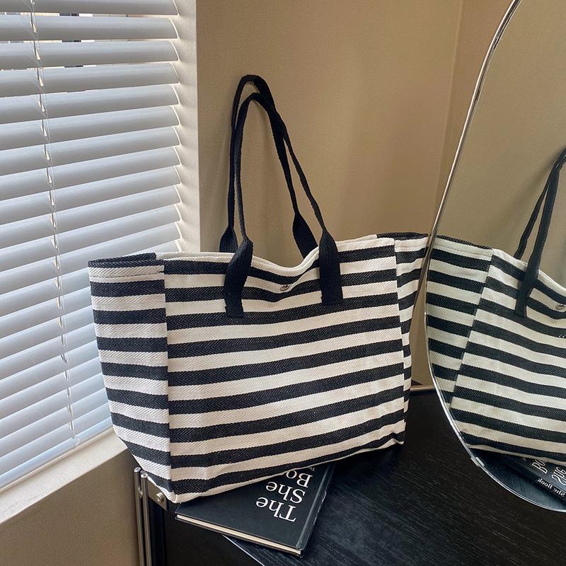 Commuter canvas bag women s large capacity tote bag bag new striped one-shoulder mommy tote bag Korean version