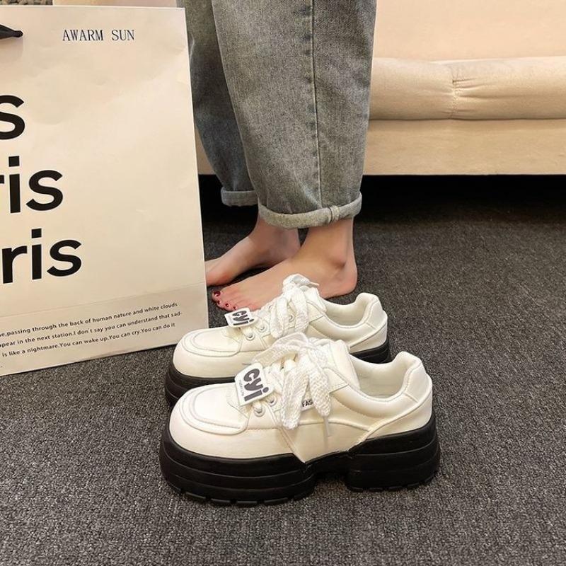 

Versatile little white shoes women s muffin platform dad shoes spring and autumn new niche height-increasing sports shoes 40