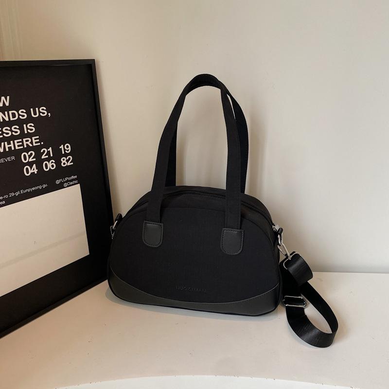 

Niche simple casual shoulder bag women s 2025 autumn Korean version fashionable foreign style solid color hand carry messenger shell bag Small