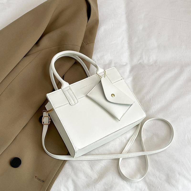 

New solid color, advanced texture, beautiful temperament, commuter women s handbag, simple casual and versatile shoulder messenger bag білий