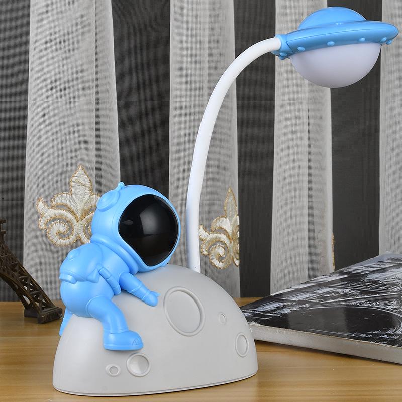 Astronaut LED Night Light: Moon Man Bedside Lamp for Student Dorms, Reading, and Desk Atmosphere.