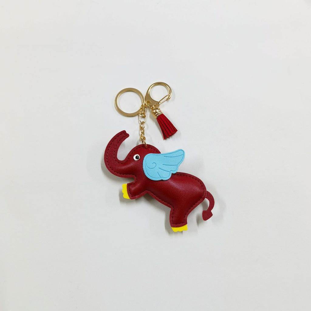 Creative flying elephant car keychain pendant leather bag pendant cute personalized car rearview mirror schoolbag pendant
