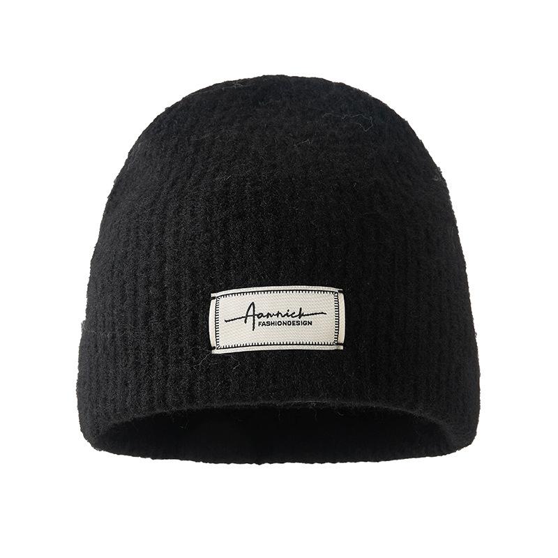 Simple cloth label wool wool hat women's autumn and winter comfortable cold hat outdoor cycling ear hat fashionable versatile knitted hat