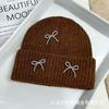 Autumn and winter new Xiaoxiangfeng steel ball bow wool hat versatile women's big head circumference ear protector knitted cold hat