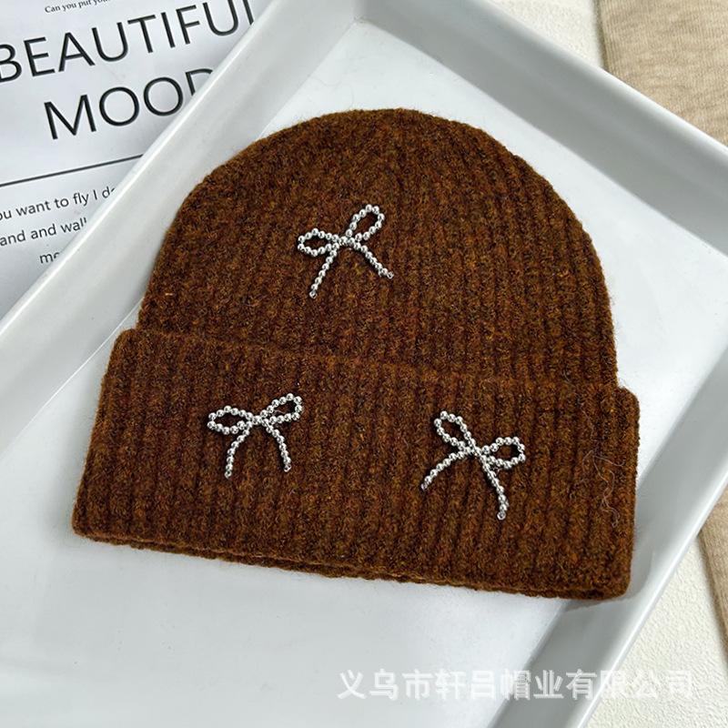 Autumn and winter new Xiaoxiangfeng steel ball bow wool hat versatile women's big head circumference ear protector knitted cold hat