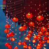 Spring Festival LED Red Lantern Ornaments: Solar Fu Character Colored String Lights for New Year Balcony Decor.