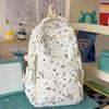 Schoolbag small fresh student schoolbag female ins cartoon star printing junior high school student large capacity backpack burden reduction spine bag