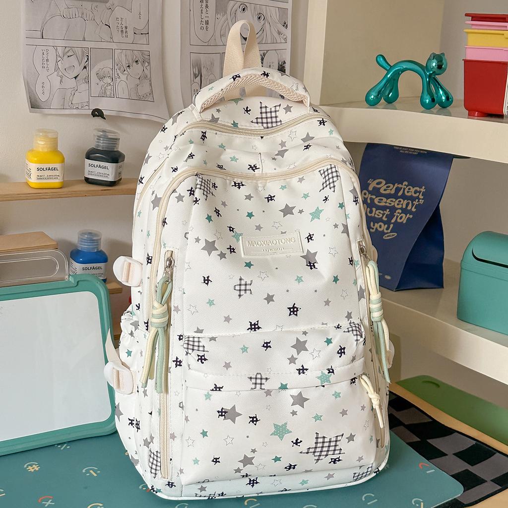 Schoolbag small fresh student schoolbag female ins cartoon star printing junior high school student large capacity backpack burden reduction spine bag