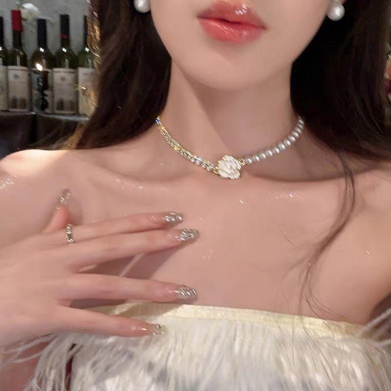 

Romantic escape double-layer bow pearl necklace women s light luxury niche elegant suit collarbone chain neck chain tide